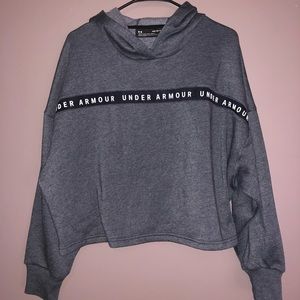 never worn. Under Armour cropped hoodie. dark grey.